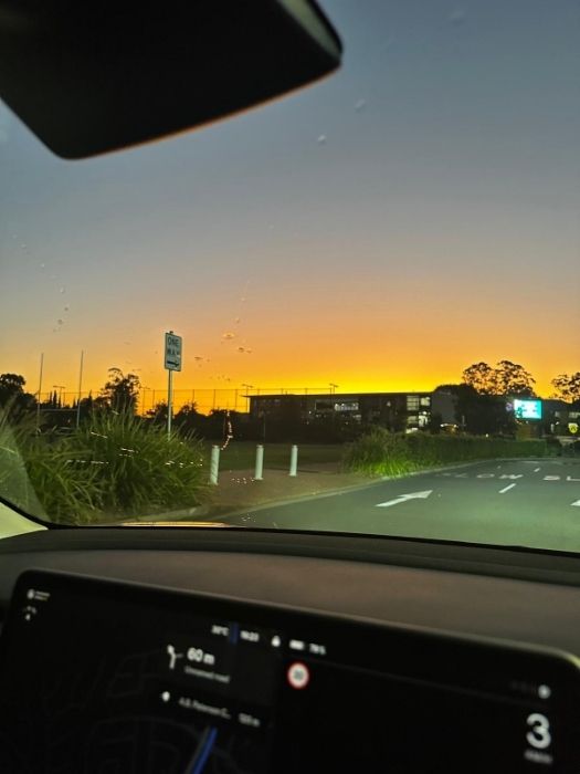 Sunset over A.B. Paterson College, Arundel, photographed from the car at netball pick up