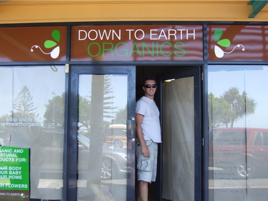 Andrew Thomson standing at the door of Down to Earth Organics, the original Kingscliff flower shop on Marine Parade