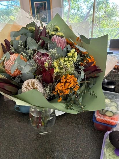 Customer photo of an Australian Natives Bunch from Lily's Florist on a kitchen bench in NSW