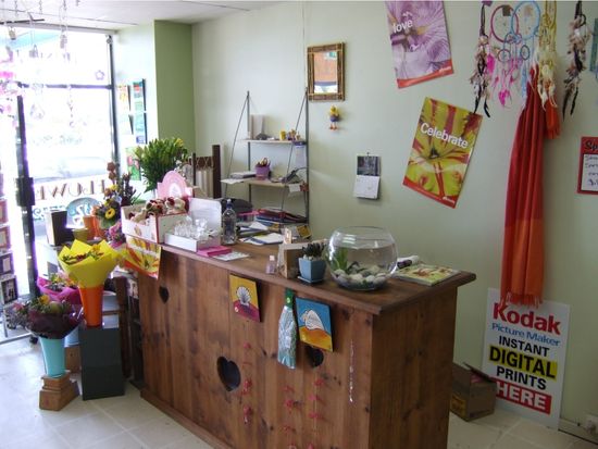 Inside the original Kingscliff Florist shop in 2006, wooden counter and lime green walls