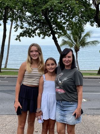 Siobhan Thomson with daughters Asha and Ivy at Trinity Beach, January 2021
