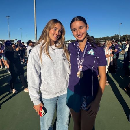 Ivy and Asha Thomson after Ivy's team won the Queensland state netball title at Maroochydore Multi Sports Complex on the Sunshine Coast in 2025
